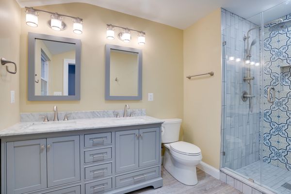 Before photo of an outdated Downey CA bathroom with old fixtures and poor layout